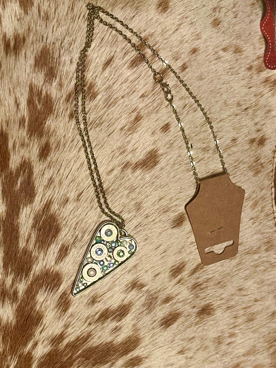 Heart-shaped Swarovski crystal necklace with bullet shell accents