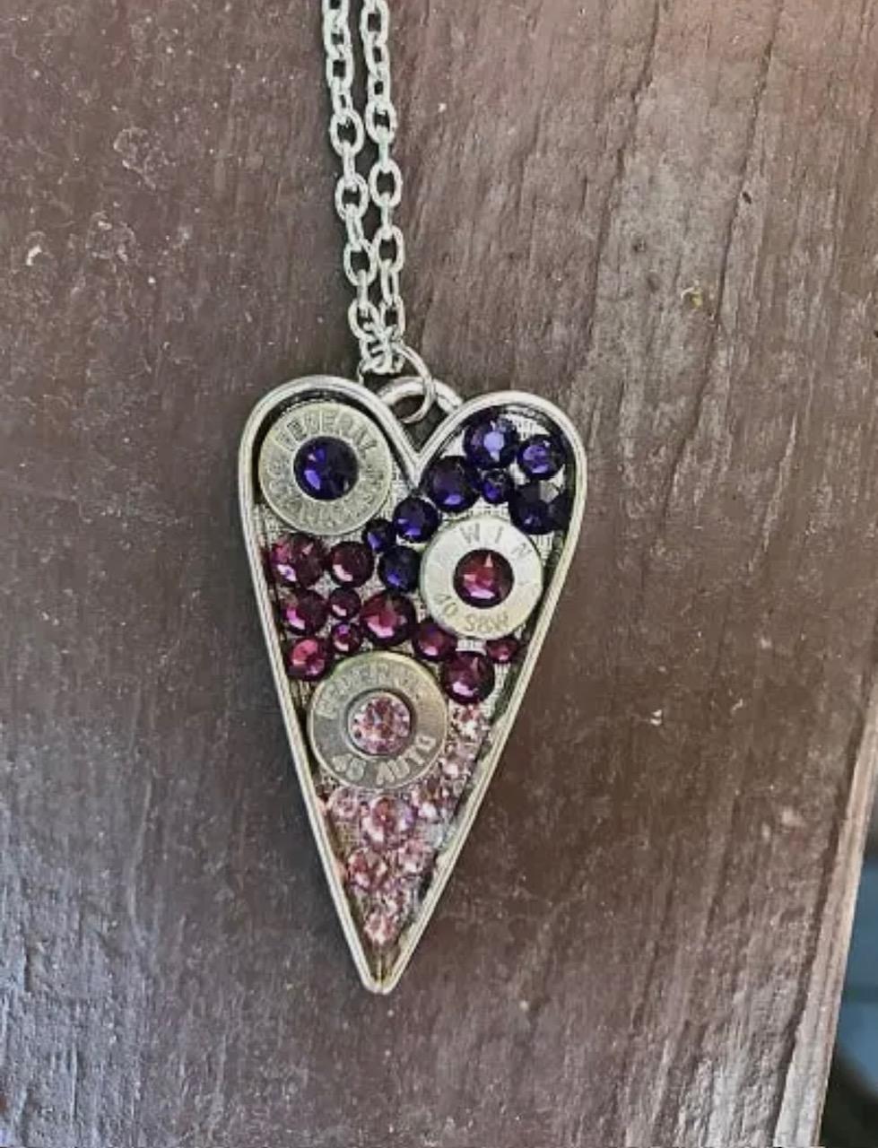 Heart-shaped Swarovski crystal necklace with bullet shell accents