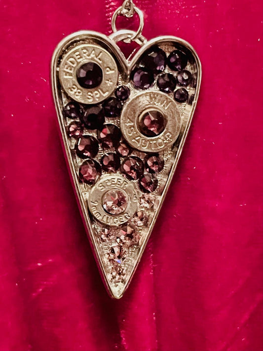 Heart-shaped Swarovski crystal necklace with bullet shell accents
