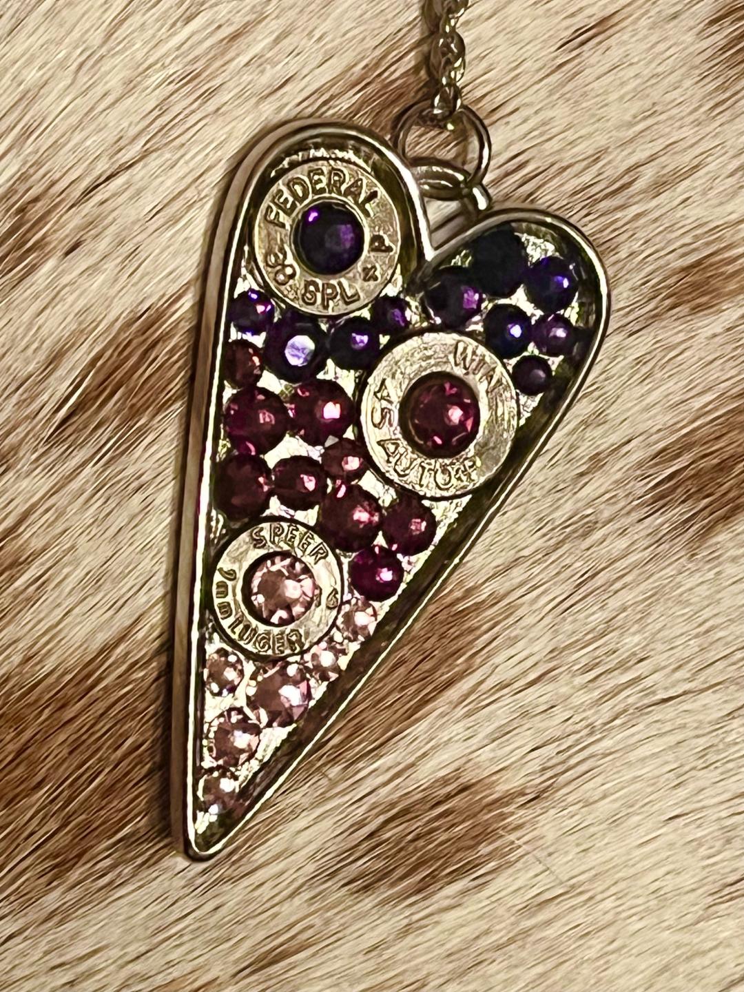 Heart-shaped Swarovski crystal necklace with bullet shell accents