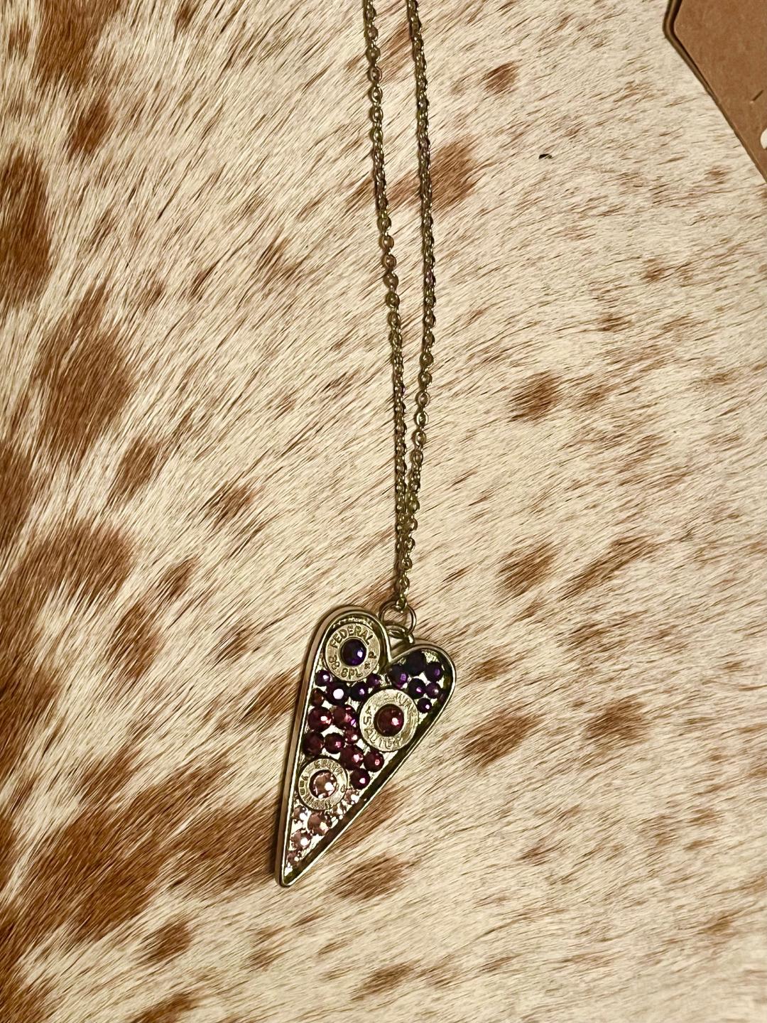 Heart-shaped Swarovski crystal necklace with bullet shell accents