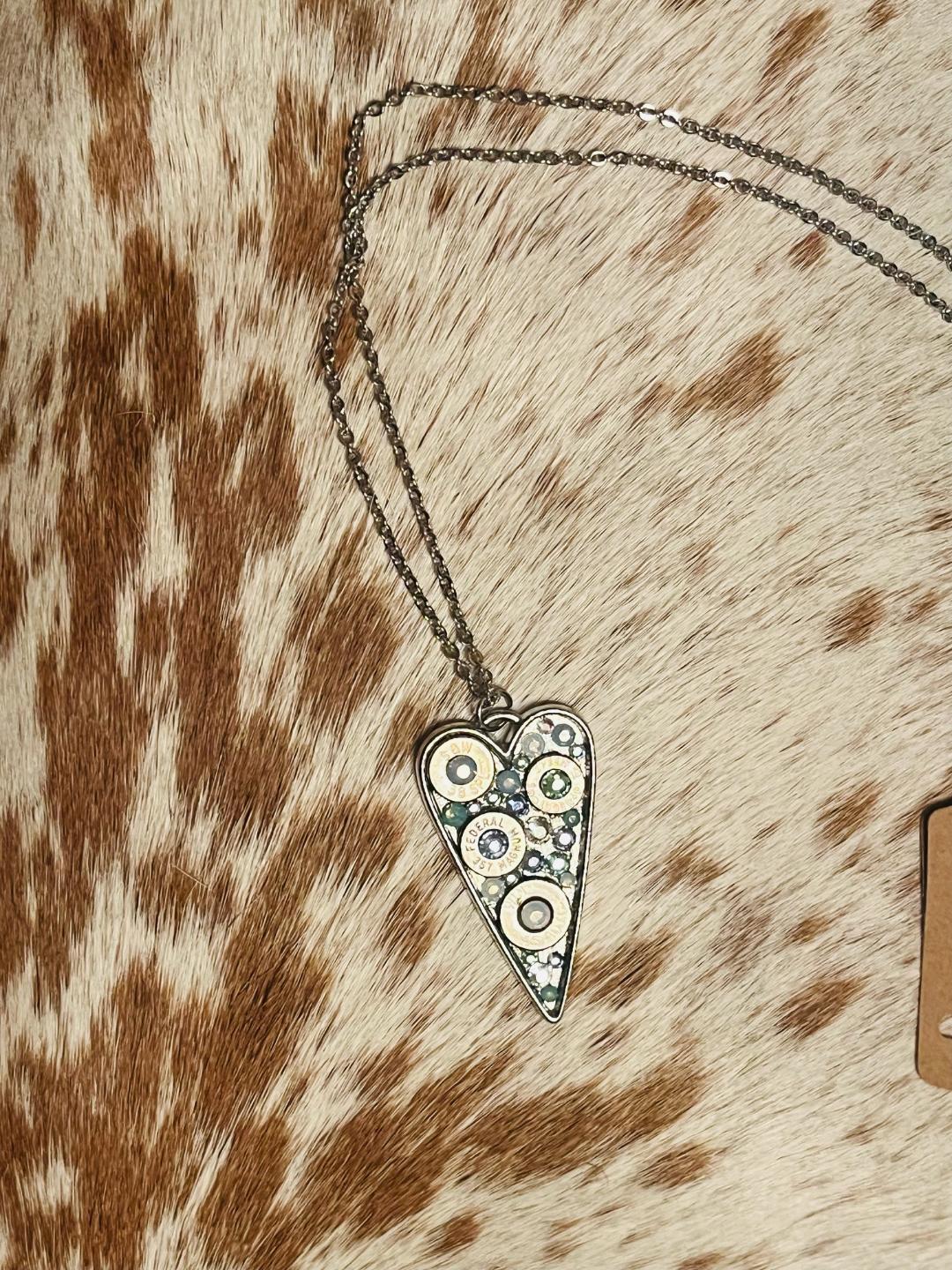 Heart-shaped Swarovski crystal necklace with bullet shell accents