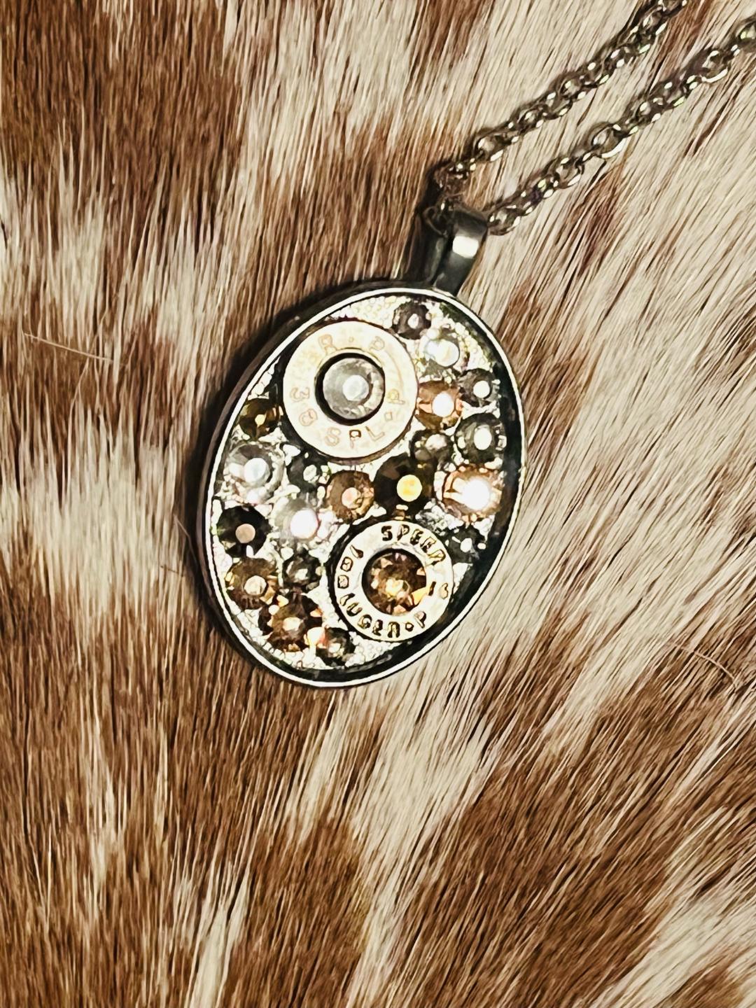 Golden Oval Swarovski crystal and bullet shell necklace