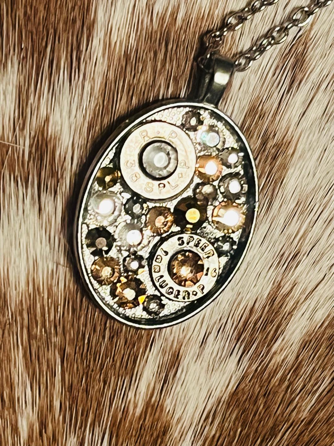 Golden Oval Swarovski crystal and bullet shell necklace