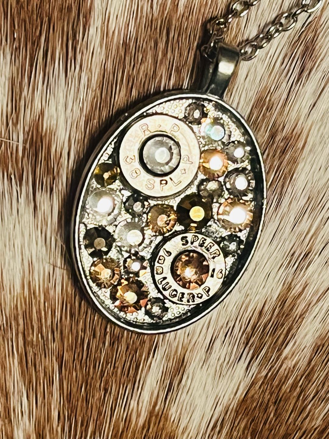 Golden Oval Swarovski crystal and bullet shell necklace