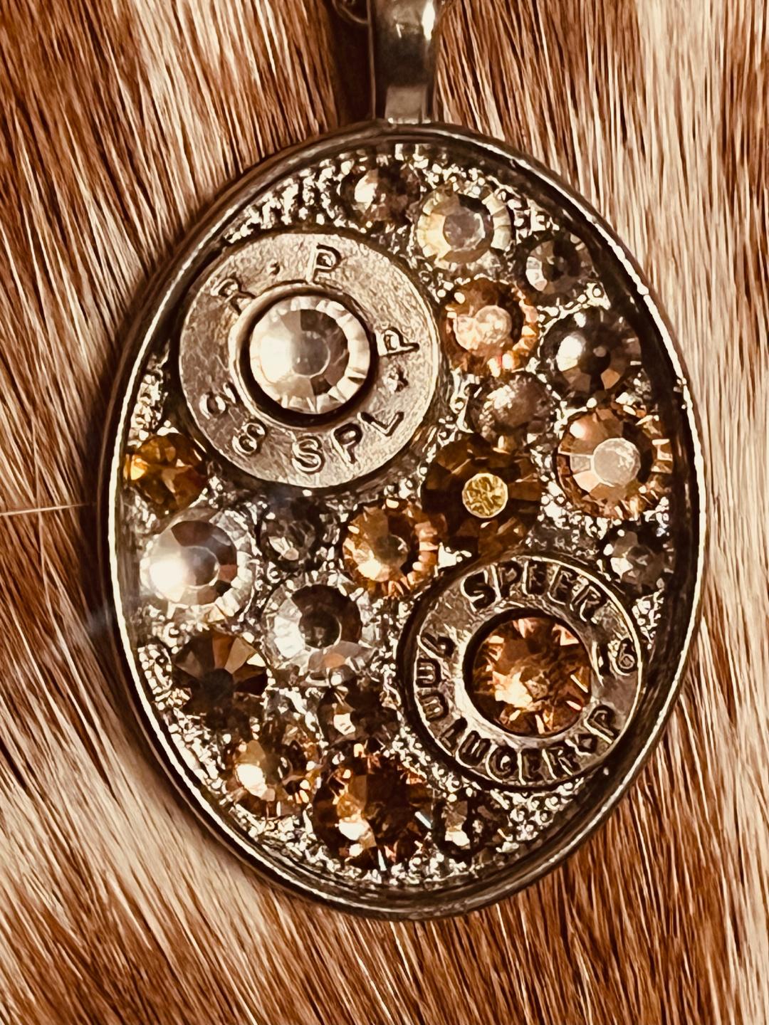 Golden Oval Swarovski crystal and bullet shell necklace