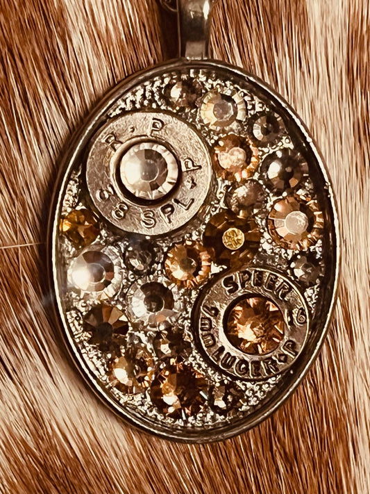 Golden Oval Swarovski crystal and bullet shell necklace